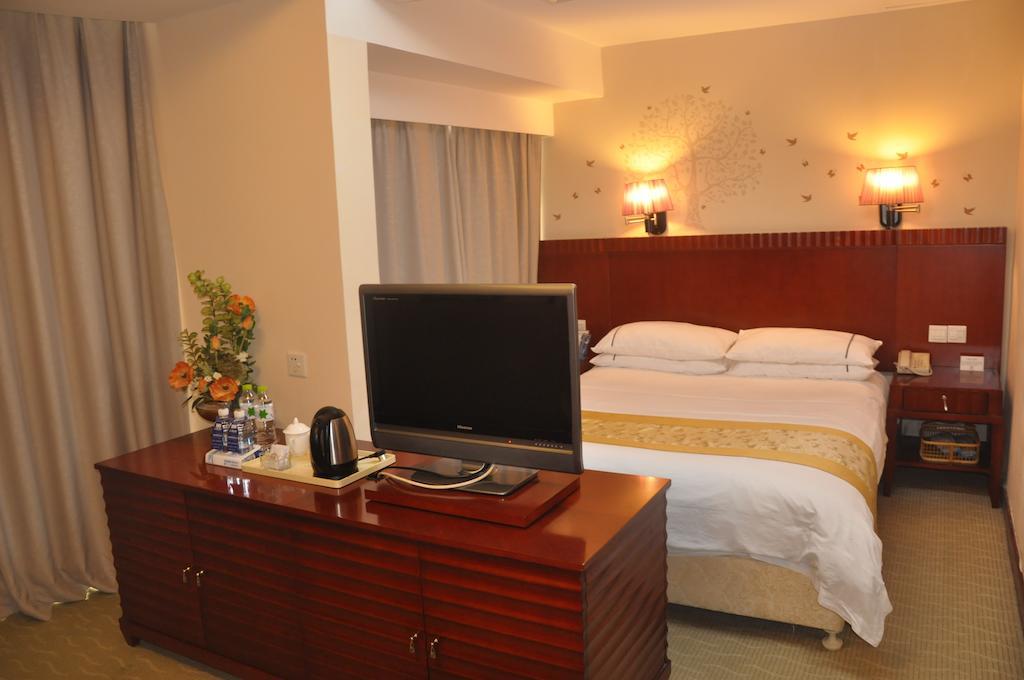 Starway Hotel Silver Джухай Стая снимка