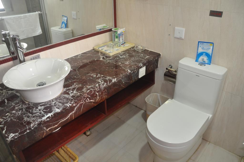 Starway Hotel Silver Джухай Стая снимка